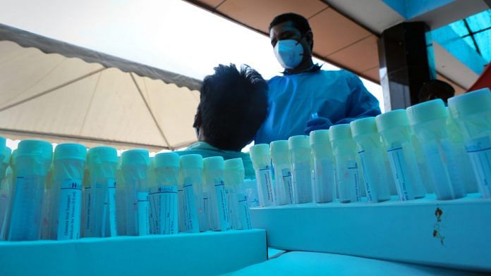 Testing vials at a Covid-19 testing site set up at Anand Vihar Terminal railway station in New Delhi, India, on 3 August, 2021 | Photographer: T. Narayan | Bloomberg