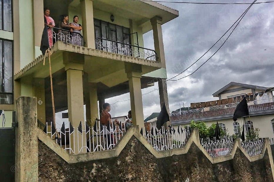 Black flag outside the house of Cherishterfield Thangkhiew, who was allegedly encountered during a police raid in on 13 August. | Photo: Praveen Jain/ThePrint