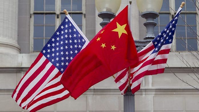 File photo | Flags of the US and China fly along Pennsylvania Avenue in Washington | D.C Andrew Harrer/Bloomberg