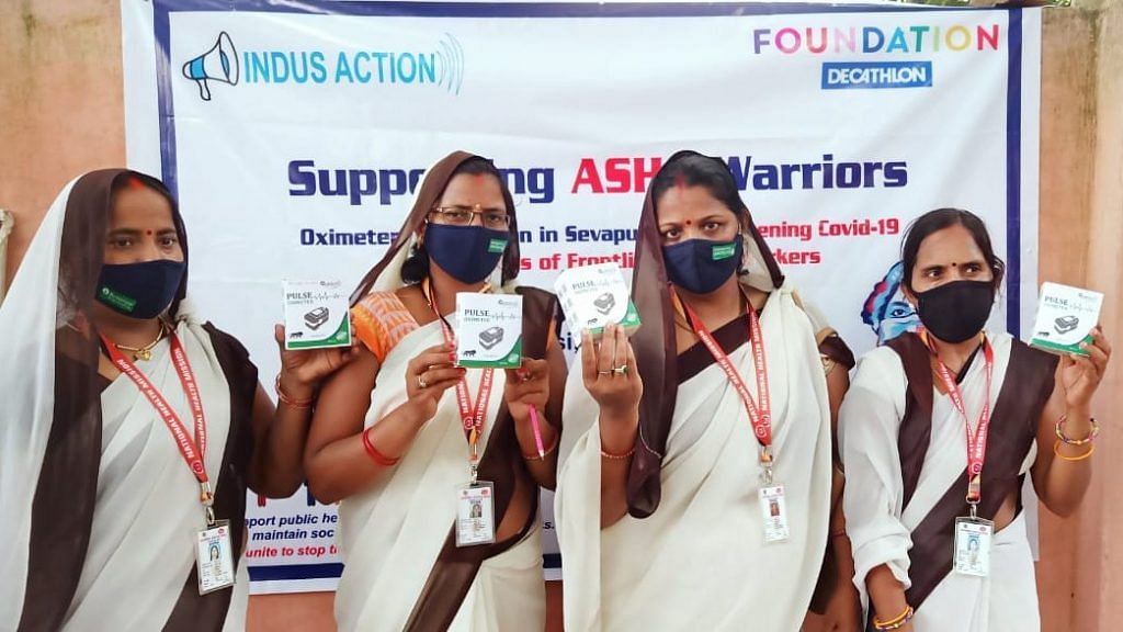 A drive organised by Indus Action distributing oximeters to ASHA Workers in Sevapuri Block in Uttar Pradesh