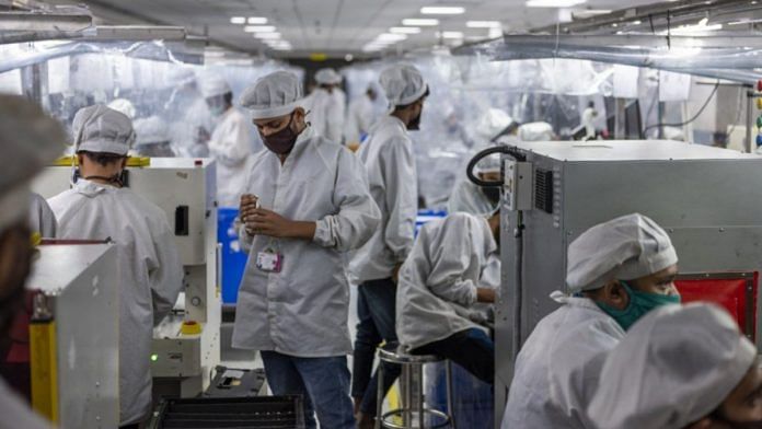 Workers manufacture phones on an assembly line at the Lava International Ltd. factory in Noida | Representational image | Photographer: Prashanth Vishwanathan | Bloomberg