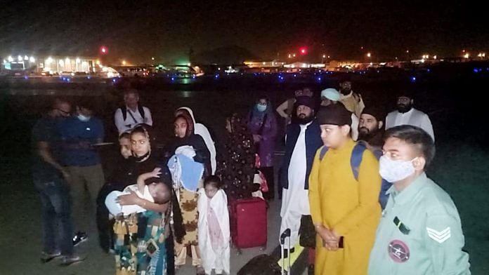 Representational image | Passengers of an IAF special repatriation flight that is Delhi bound, at Kabul airport on 22 August 2021 | ANI