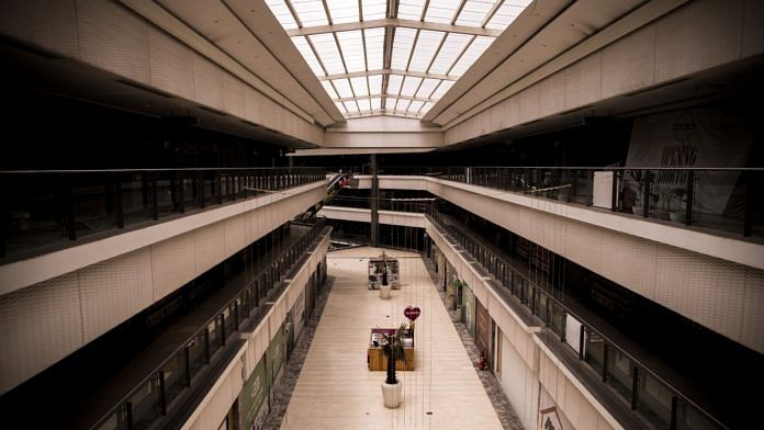 A shopping mall deserted during lockdown restrictions in Noida, India | Bloomberg