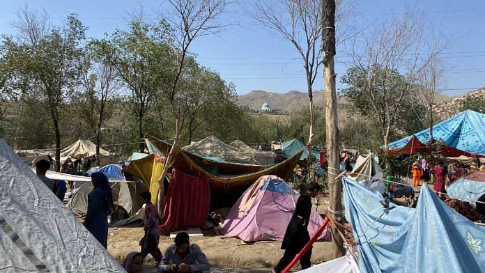 Afghans fleeing the Taliban onslaught through the country set up tents in a compound at the capital's Khairkhana locality | Nayanima Basu | ThePrint