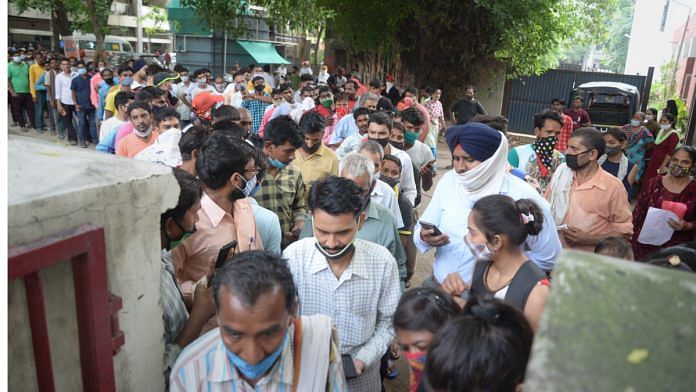 Beneficiaries in large number arrive to receive a dose of Covid-19 vaccine at a vaccination centre in Jalandhar on 24 August 2021 |PTI