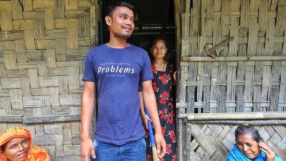 Debu Devbarman, a labourer from the area, and his sister Deepali RAi (standing behind him) | Photo: Praveen Jain/ThePrint