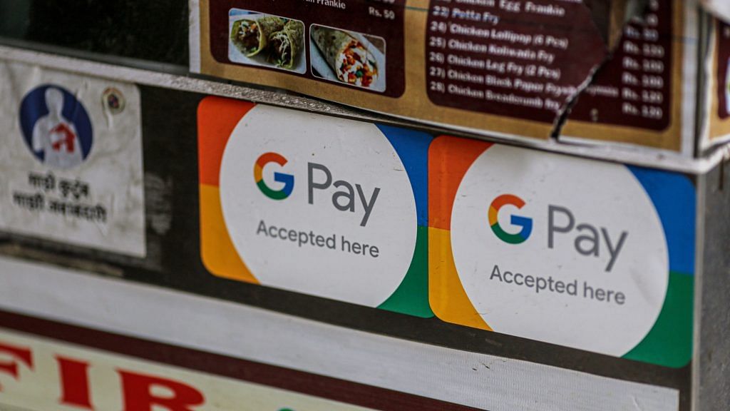 A store advertises the use of the Google Pay digital payment system in Mumbai
