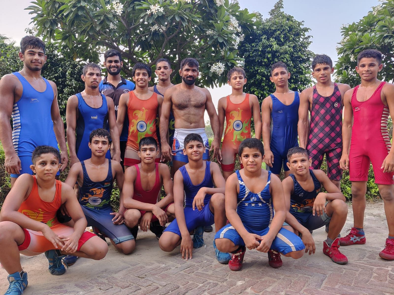 Olympic champion Yogeshwar Dutt with his students at his wrestling academy in Sonipat | Photo: Shubhangi Misra/ThePrint