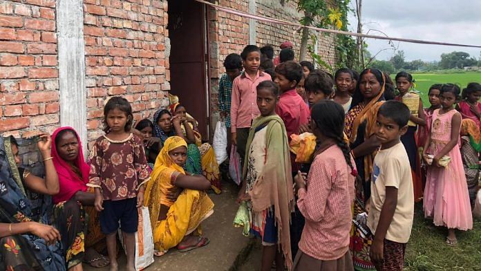 In Sobhadra students and their parents wait to receive MDM ration | Jyoti Yadav |ThePrint
