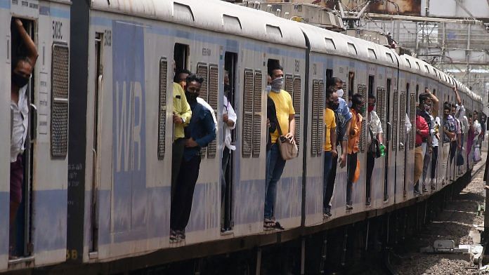 A local train leaves from Dadar station in Mumbai, on 21 June 2021