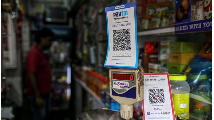 A general store advertises the use of the Paytm digital payment system in Mumbai, India, on 17 July 2021. Photographer: Dhiraj Singh/Bloomberg