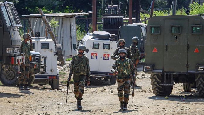 Security personnel during an encounter with militants at Sopore area of Baramulla district, on 24 August 2021 | PTI
