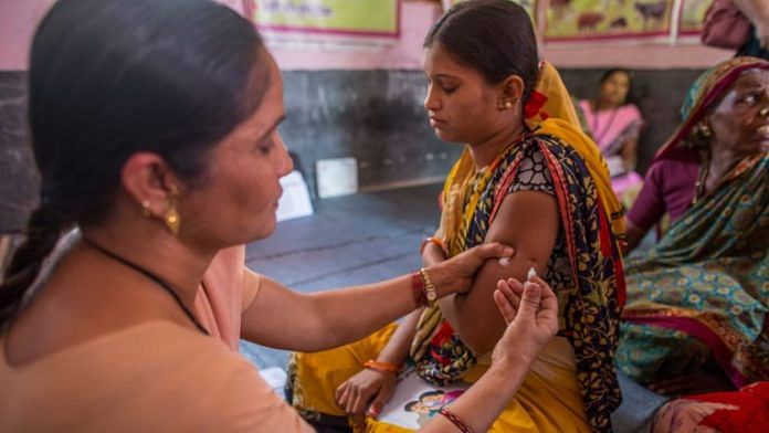 A health worker immunises a pregnant woman at a health centre in Aurangabad (Representational image) | Bloomberg