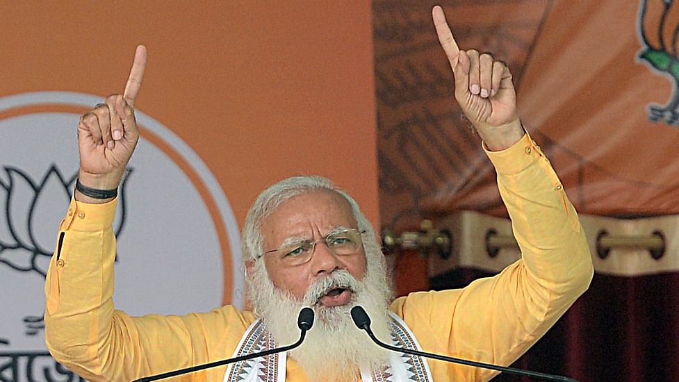 Modi sheds his 'ascetic' look, lands in US with trimmed beard & hair, 'ready for business' Modi sheds his 'ascetic' look, lands in US with trimmed beard & hair, 'ready for business'