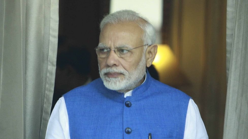 Modi sheds his 'ascetic' look, lands in US with trimmed beard & hair, 'ready for business' Modi sheds his 'ascetic' look, lands in US with trimmed beard & hair, 'ready for business'