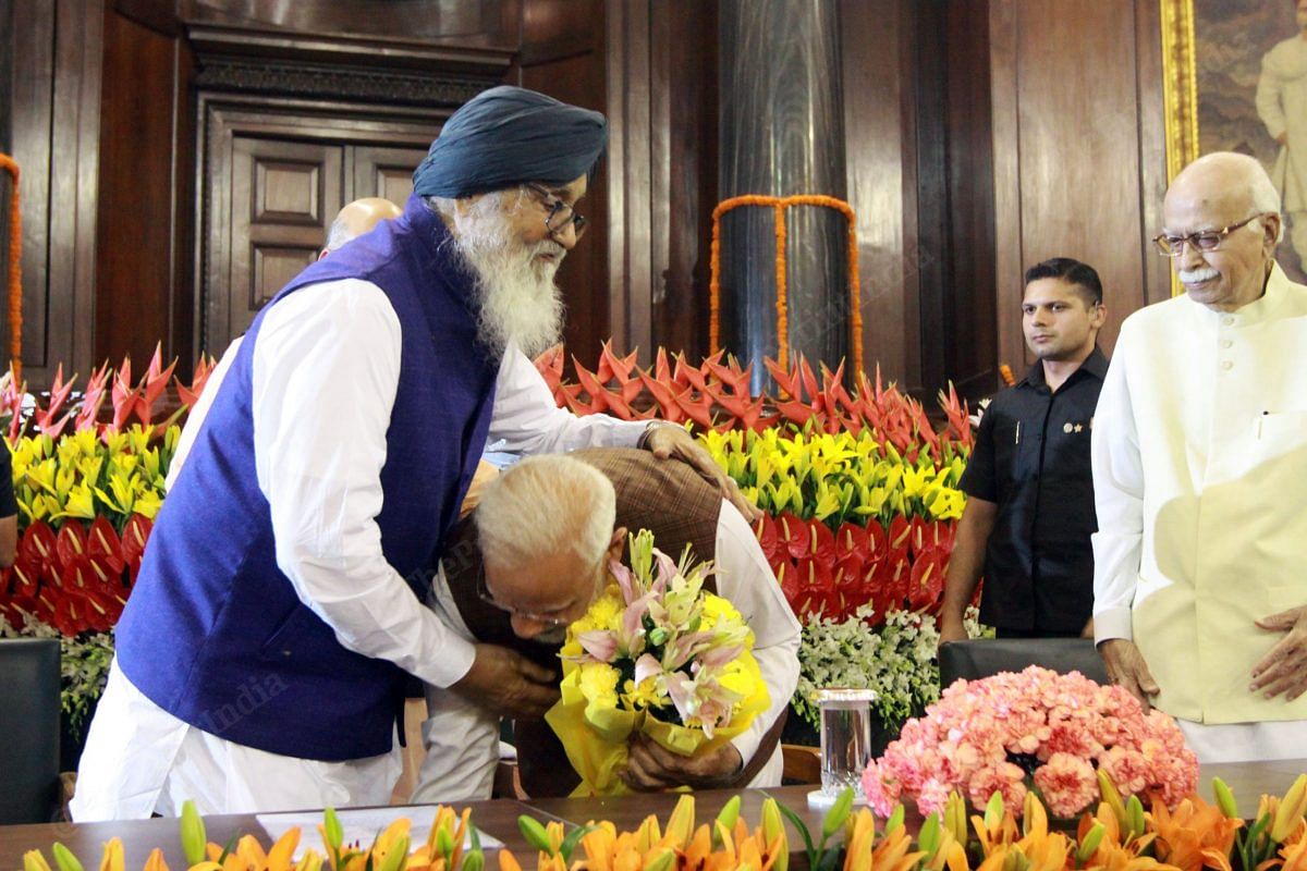 PM Modi greets Akali Dal patron Parkash Singh Badal at the parliamentary meeting | Photo: Praveen Jain | ThePrint
