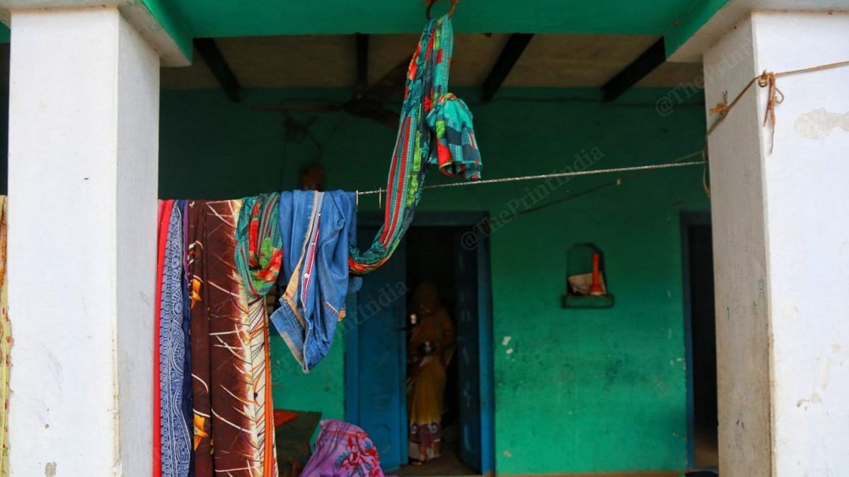 The saree the mother wore on the day her daughter’s body was forcibly cremated lies hanging from the verandah ceiling | Photo: Manisha Mondal/ThePrint
