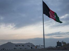 An Afghan flag flying on a hilltop in Kabul | File photo: Victor J. Blue | Bloomberg