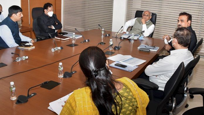 Newly appointed Gujarat Chief Minister Bhupendra Patel holds a meeting to review the situation created due to heavy rains in the state, in Gandhinagar on 13 September 2021 | PTI