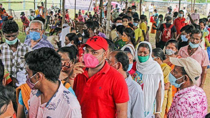 People wait to receive Covid-19 vaccine dose during a vaccination drive in Birbhum district, West Bengal on 21 September 2021 | PTI