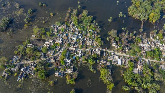 Representational image | Flood water surrounds buildings and land in India | Prashanth Vishwanathan | Bloomberg