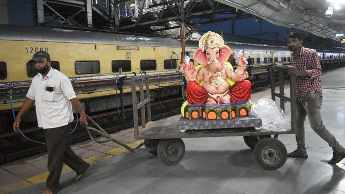 Devotees carry an idol of Lord Ganesha to take via train to Karnataka, from Solapur in Maharashtra, on 5 September 2021 | PTI