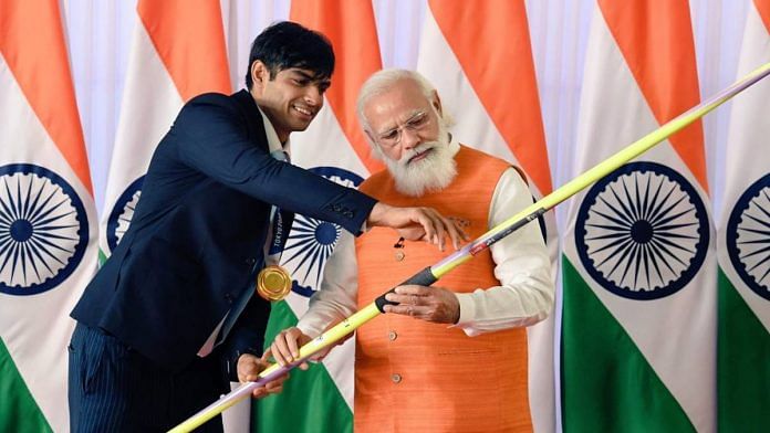 Olympic gold medallist Neeraj Chopra shows his javelin to Prime Minister Narendra Modi, in August 2021 | Neeraj Chopra | Twitter