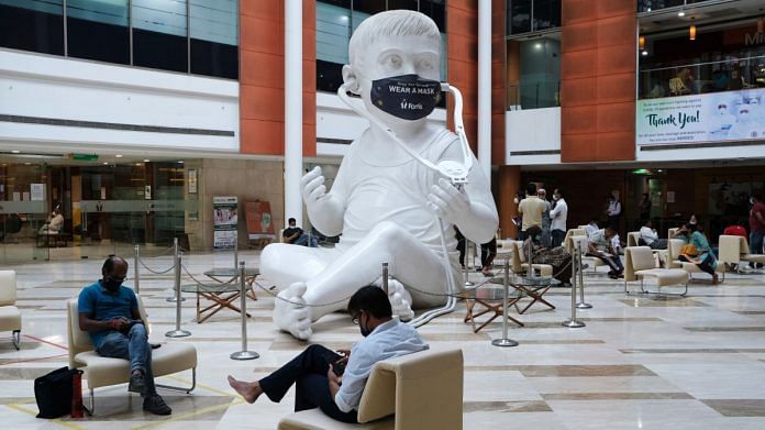 A protective mask adorns the sculpture of a baby with a stethoscope in the lobby at the Fortis Memorial Research Institute hospital in Gurgaon | Photographer: T. Narayan | Bloomberg A protective mask adorns the sculpture of a baby with a stethoscope in the lobby at the Fortis Memorial Research Institute hospital in Gurgaon | Photographer: T. Narayan | Bloomberg