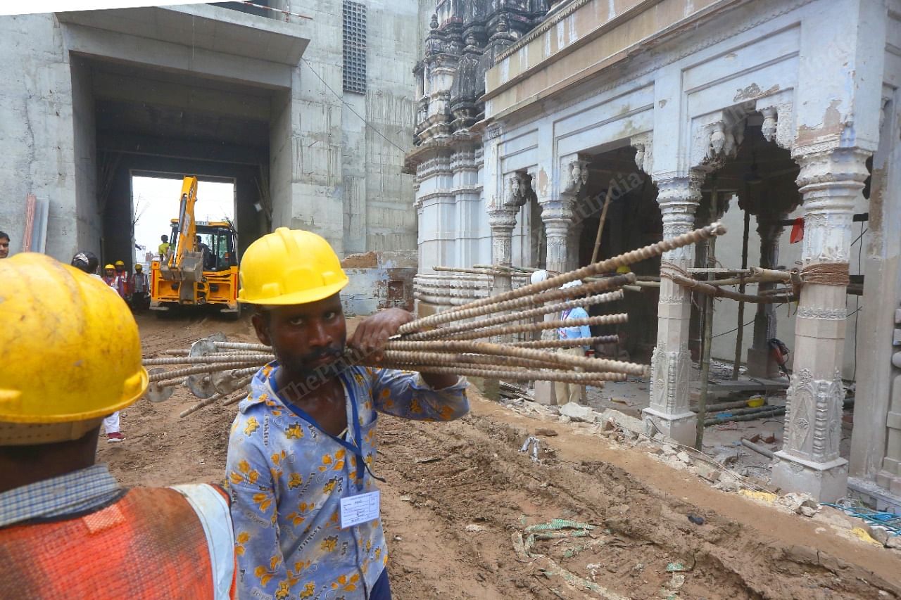 Worker carrying out work at Kashi Vishwanath Dham Project | Photo: Praveen Jain | ThePrint