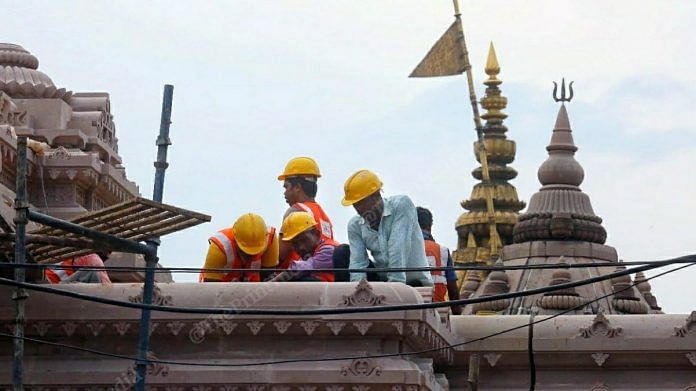 Construction workers build the main gate to the Kashi Vishwanath Dham | Photo: Praveen Jain | ThePrint