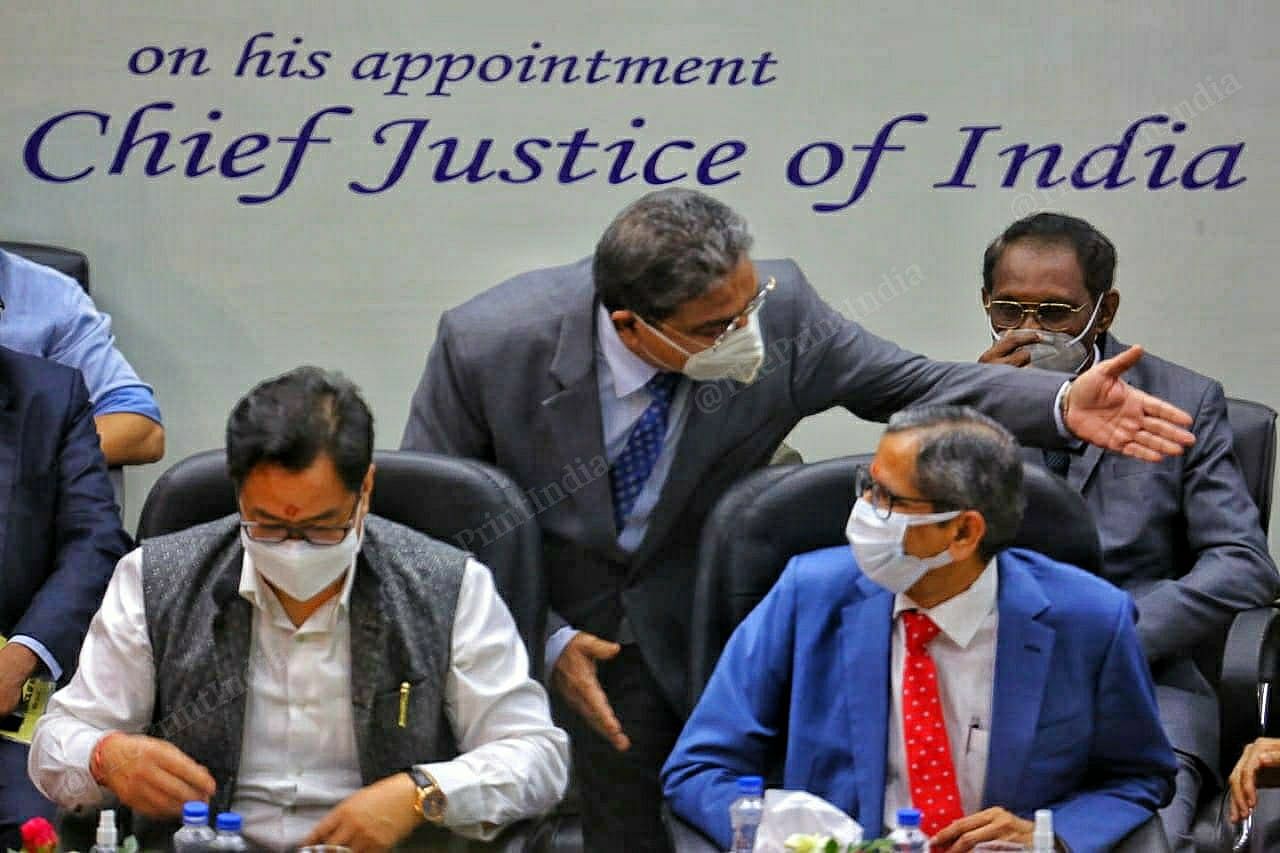 Law Minister Kiren Rijiju and CJI N. V. Ramana with Justice Vineet Saran | Praveen Jain | ThePrint