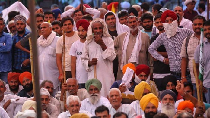 Farmers gathered outside the mini secretariat in Karnal | Photo: Suraj Singh Bisht | ThePrint