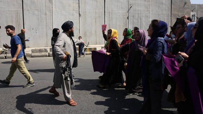 A Taliban fighter confronts a group of women demonstrating for women's rights in Kabul, on 4 September 2021 | Photographer: Bilal Guler/Anadolu Agency/Getty Images via Bloomberg