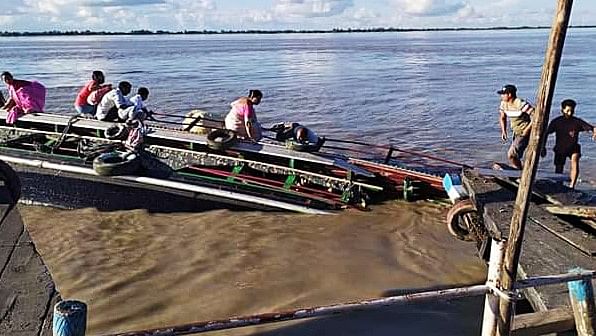 A capsized boat on the Brahmaputra river in Jorhat district of Assam, on 8 September 2021