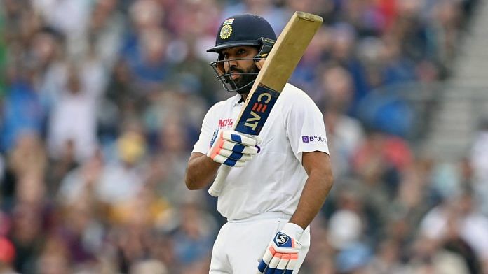Indian opener Rohit Sharma slams his bat after completing his first overseas century during the third day of the fourth test match between England and India at The Oval, in London on 4 September 2021. | Photo: ANI