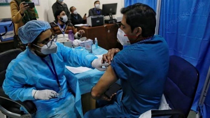 File photo of a health worker administering a Covid vaccine at a hospital in New Delhi | Photo: Manisha Mondal | ThePrint