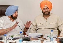 Punjab Chief Minister Captain Amarinder Singh with Navjot Singh Sidhu during a Cabinet meeting in Chandigarh | PTI