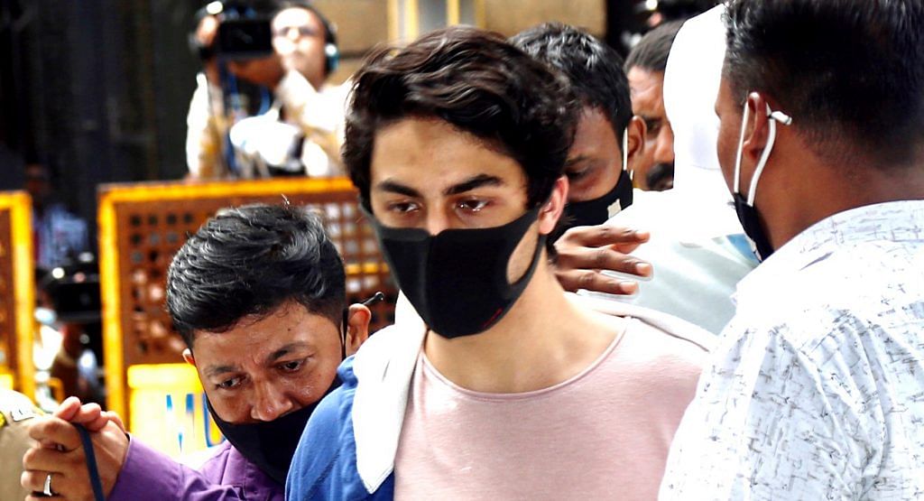 Bollywood actor Shah Rukh Khan's son Aryan Khan being escorted at the NCB office after a medical check-up in Mumbai, on 7 October 202