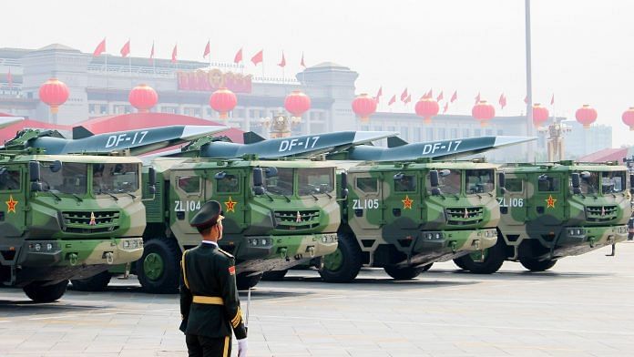 File photo of Dongfeng medium-range ballistic missiles equipped with a DF-ZF hypersonic glide vehicle, involved in a military parade to mark the 70th anniversary of the Chinese People's Republic | Photo: Zoya Rusinova/TASS/Getty Images via Bloomberg
