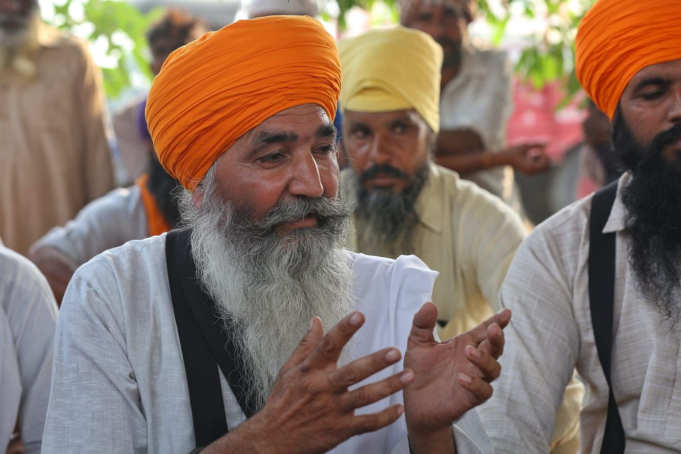 Sri Guru Granth Sahib Satkar Committee leader Tarlochan Singh in Cheema Kalan to meet Lakhbir's family | Suraj Singh Bisht | ThePrint