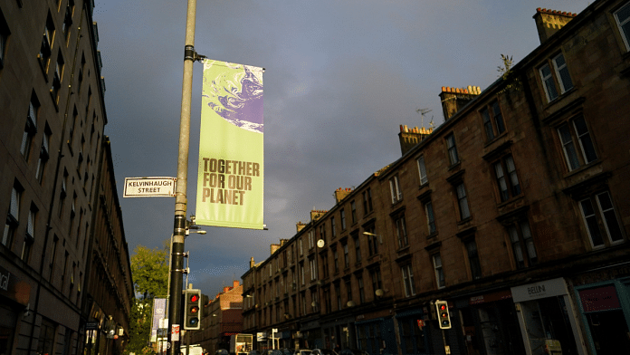 A banner advertising the upcoming COP26 climate talks in Glasgow, UK on 20 October 2021 | Photo: Ian Forsyth | Representational image| Bloomberg