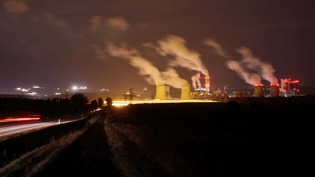Emissions rise from chimneys at the Turow coal-powered power plant | Representational image | Photo: Bartek Sadowski | Bloomberg