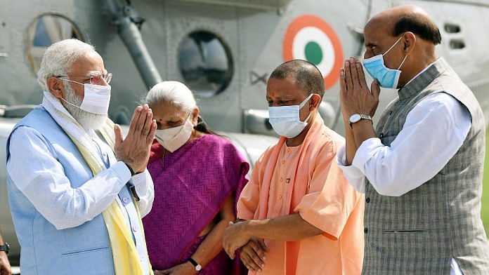 File image of Union Defence Minister Rajnath Singh and PM Narendra Modi. Also seen in the frame, Uttar Pradesh CM Yogi Adityanath and Governor Anandiben Patel | ANI