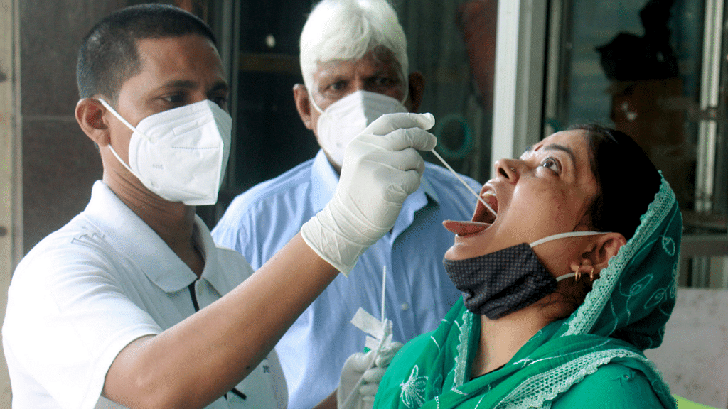 Representational image of a woman being tested for Covid-19 | Photo: ANI