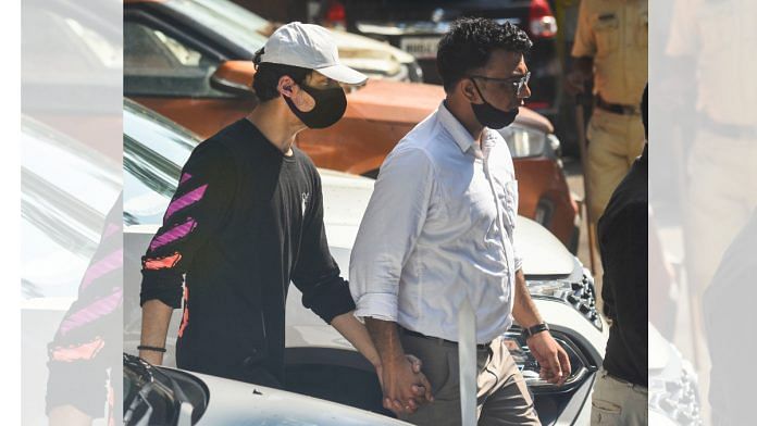 Bollywood actor Sharukh Khans son Aryan Khan, accused in a drug bust case, being taken from NCB office to the Killa court in Mumbai on 7 October 2021| PTI