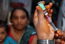 A medic prepares to administer a dose of Covid-19 vaccine to a beneficiary in Chennai on 6 October 2021 | PTI