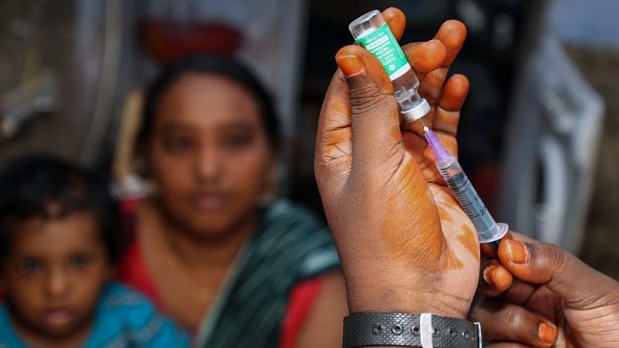 A medic prepares to administer a dose of Covid-19 vaccine to a beneficiary in Chennai on 6 October 2021 | PTI