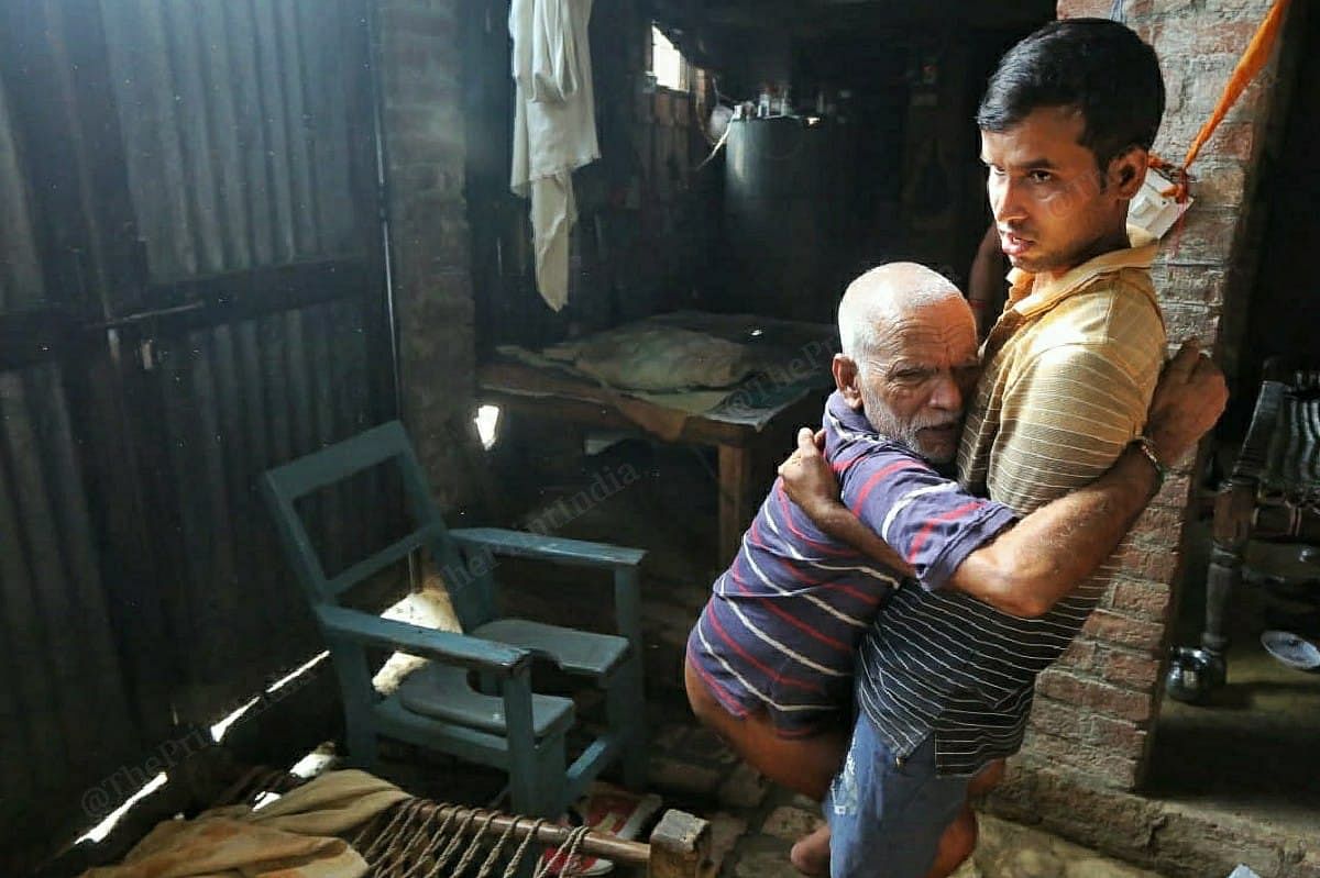 Vijay Mishra and Sushma Mishra, the parents of BJP worker Shubham Mishra | Photo: Praveen Jain/ThePrint