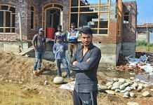 Sameer Wani, a local contractor in Eidgah, with a group of migrant workers he brought to Kashmir | Praveen Jain | ThePrint