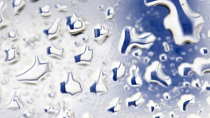 Facebook 'like' logo reflected in water droplets on a computer in San Francisco | Bloomberg File Photo